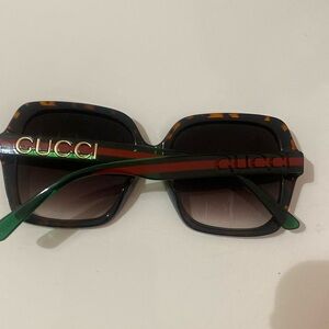 Real gucci sunglasses 
Red/green/brown frame